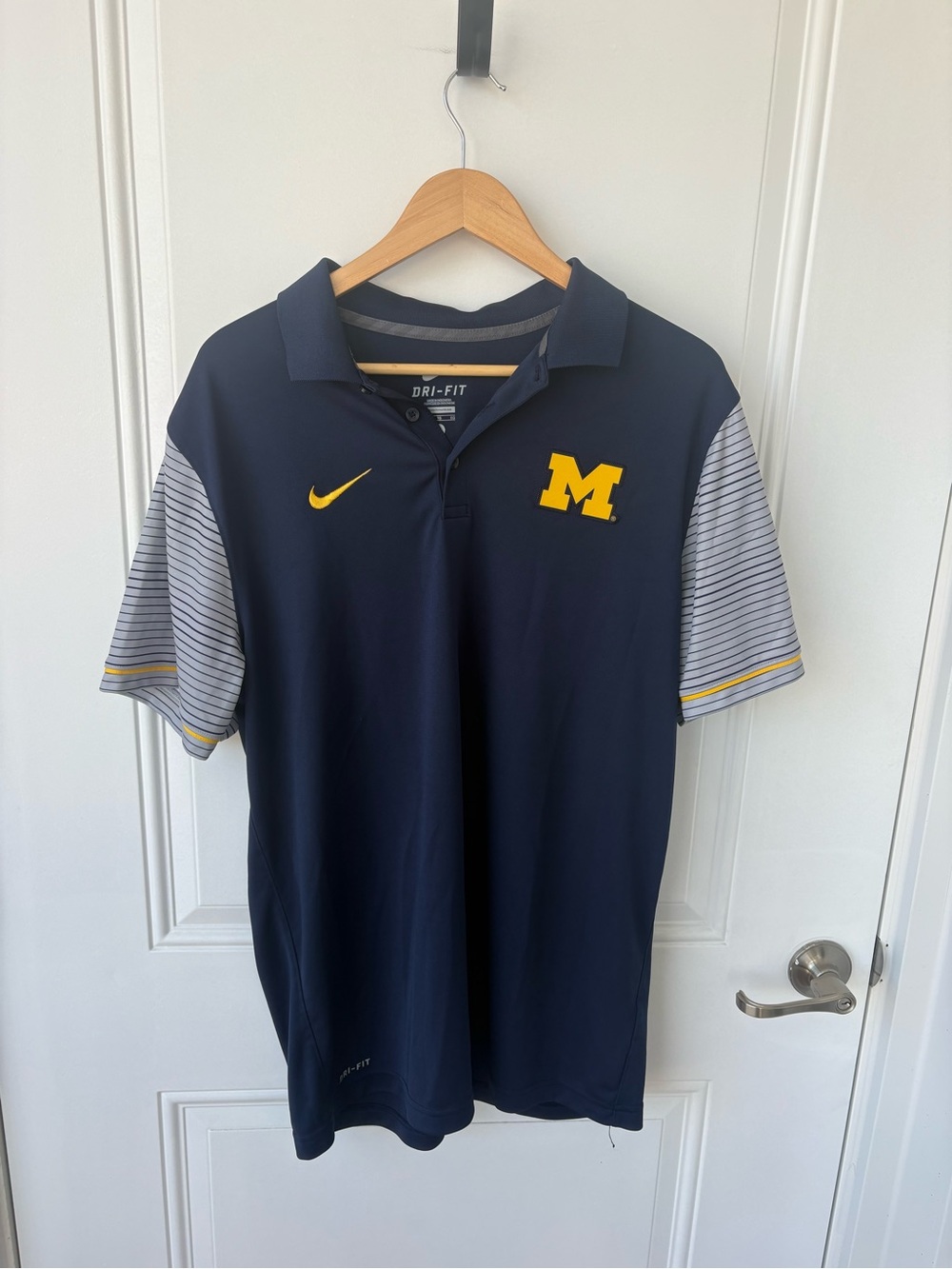 Nike Navy Polo with Yellow Michigan 'M' and Striped Gray Sleeves